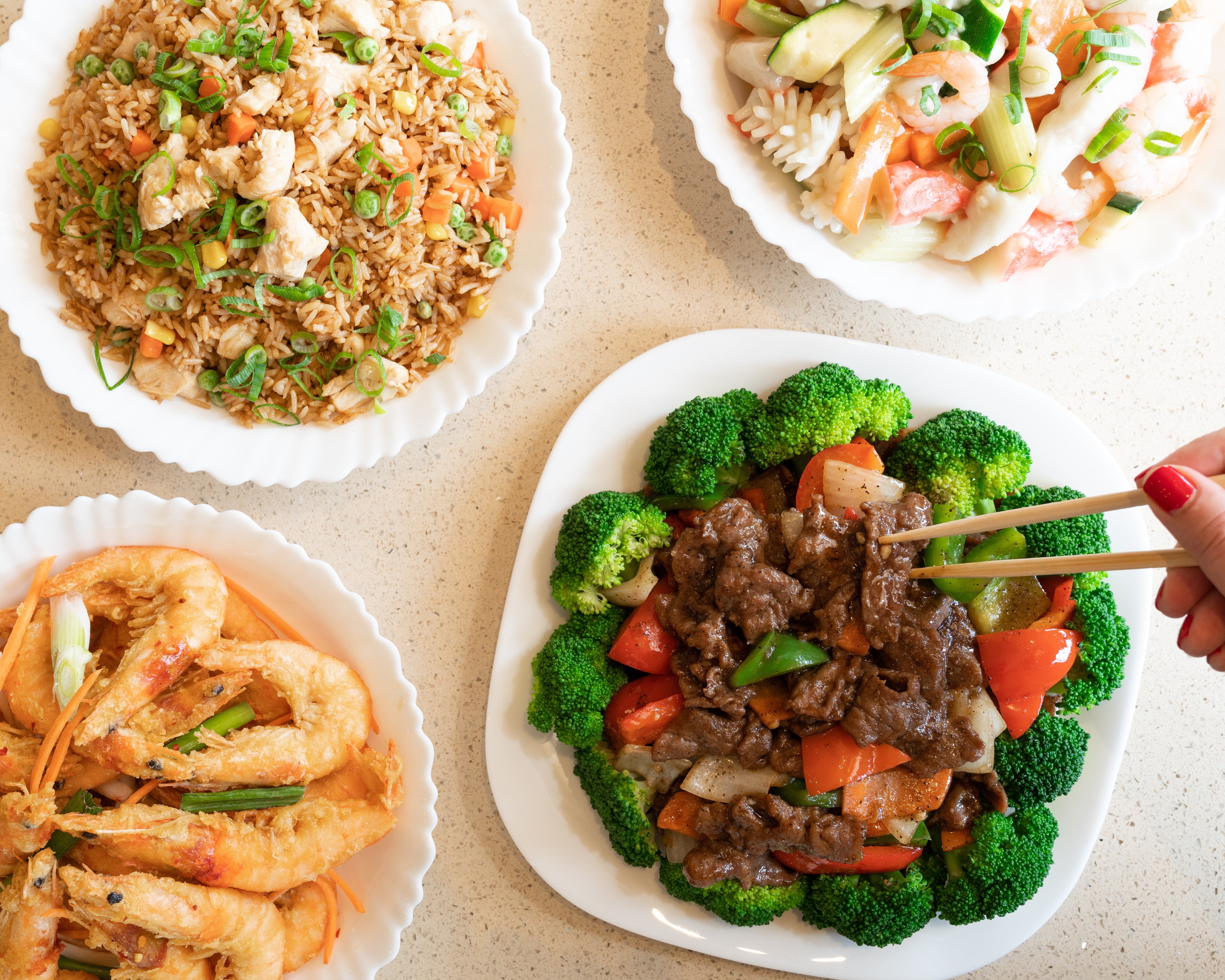 Delicious Asian cuisine with rice, shrimp, seafood, and beef